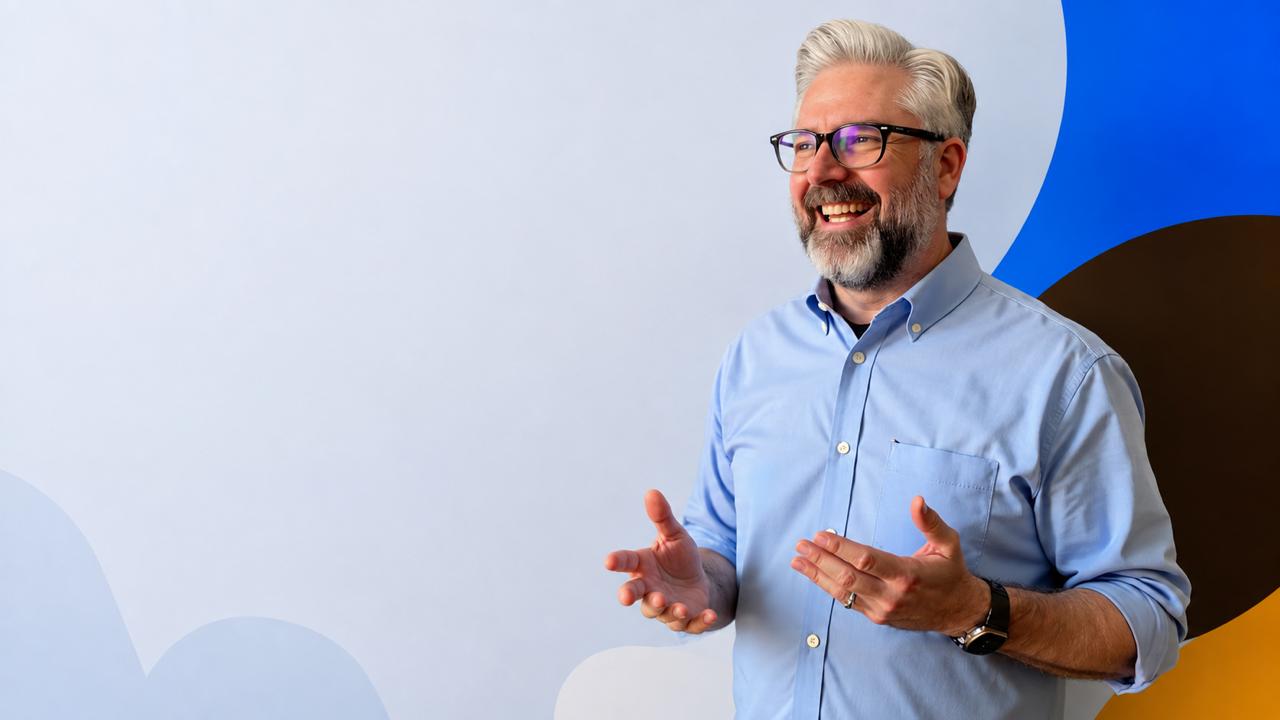 Jeremy Kenerson speaking with an open hand gesture